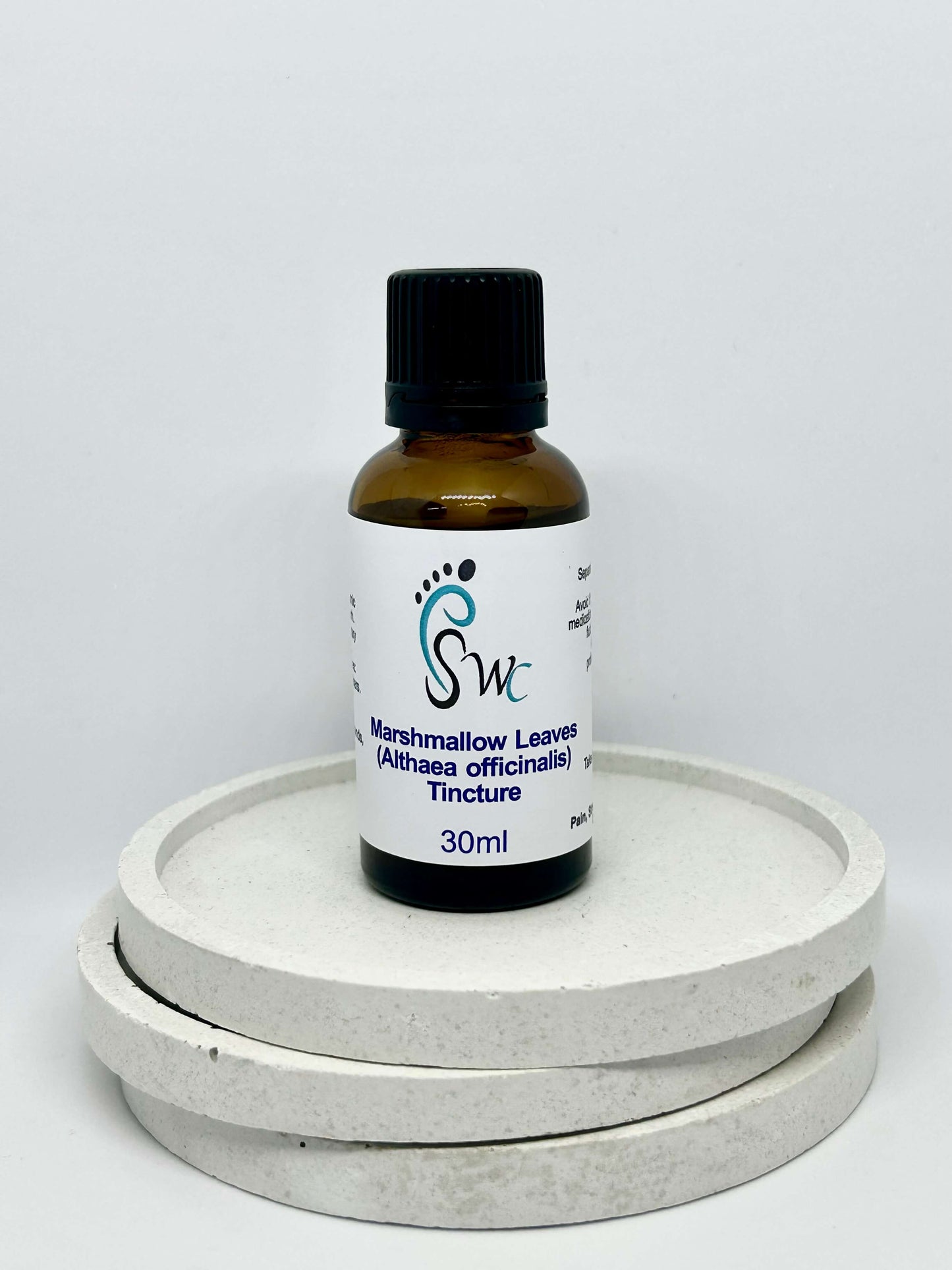 Amber glass bottle of mallow leaf tincture – natural herbal remedy for dry cough, digestive irritation, and skin inflammation