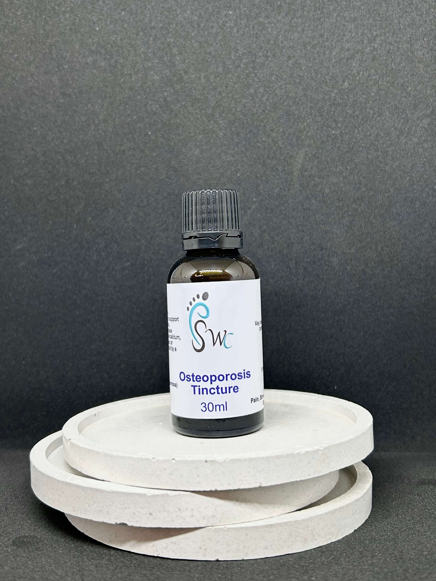 Osteoporosis Combo Tincture in glass dropper bottles, natural herbal remedy to support bone strength, calcium absorption and joint health.