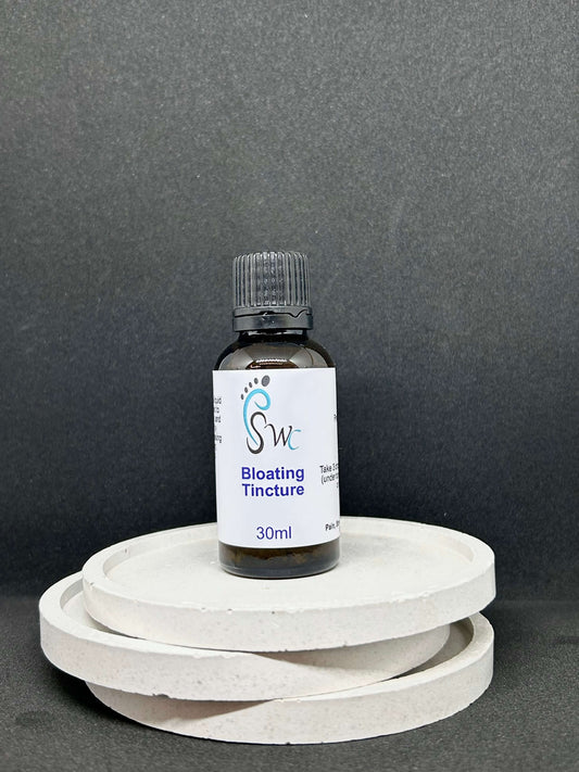 Bloating Combo Tincture in glass dropper bottles, natural herbal remedy for digestion, gas and stomach discomfort relief.