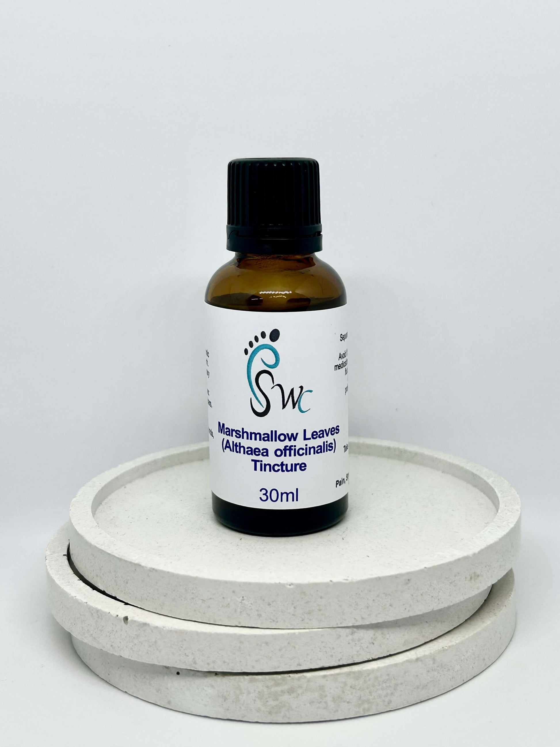 Amber glass bottle of mallow leaf tincture – natural herbal remedy for dry cough, digestive irritation, and skin inflammation